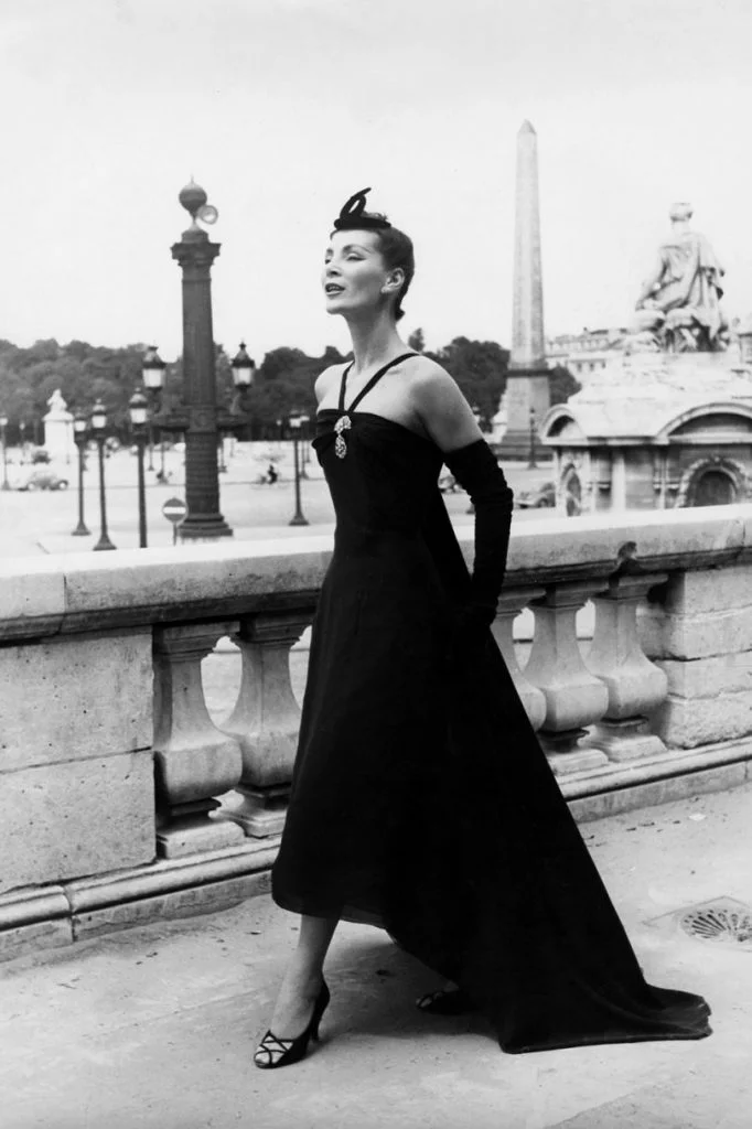 Model wears black dress Christian Dior, 1950s