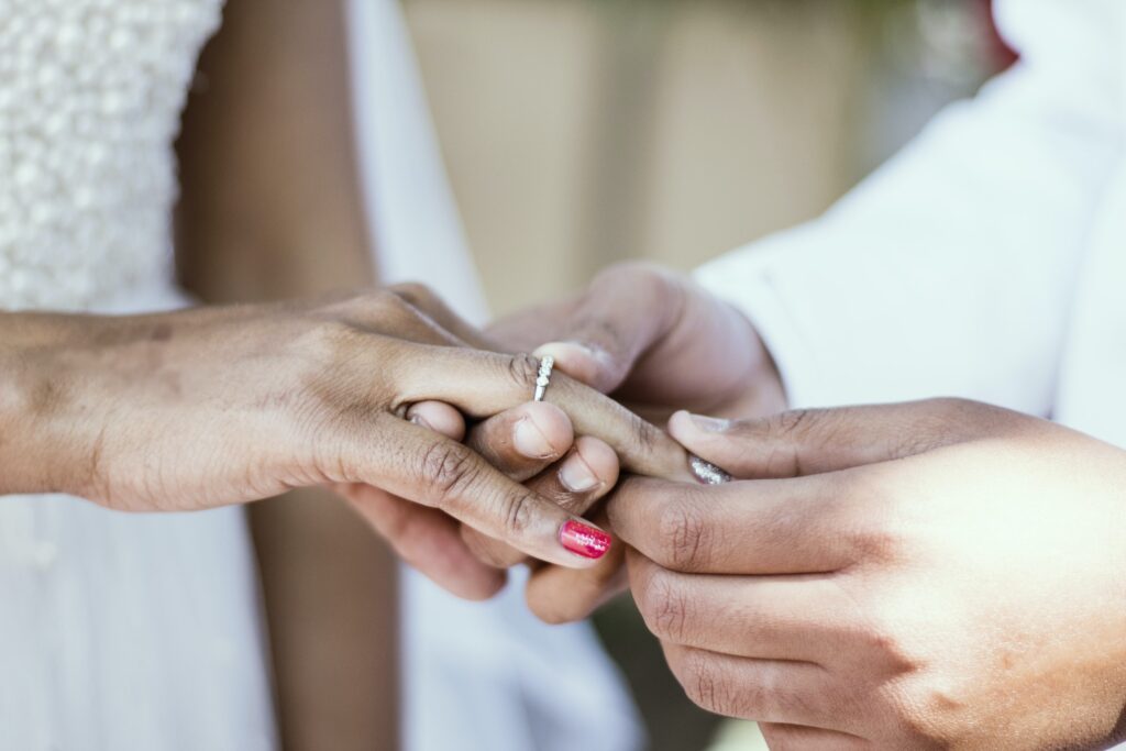 Couple exchanging rings